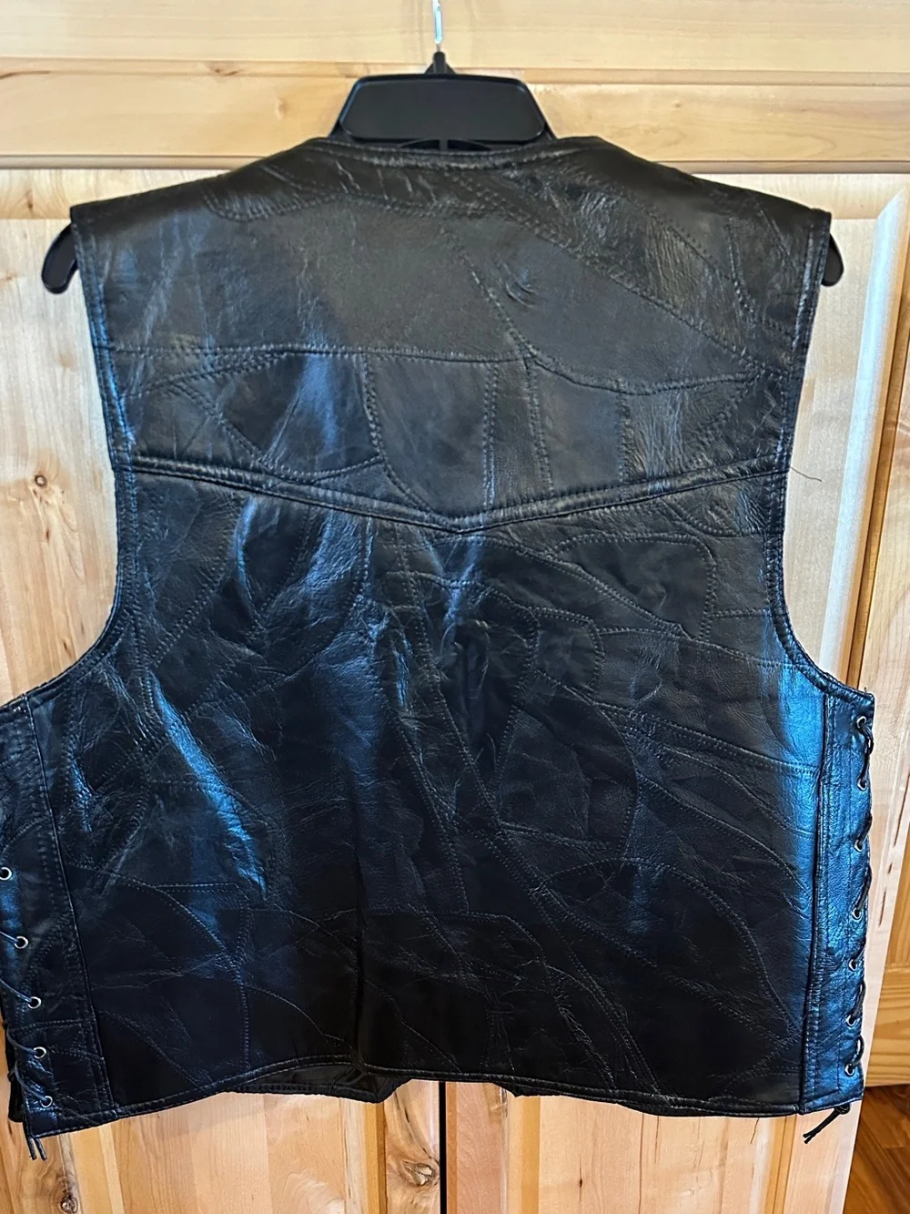 Rocky Ranch Hides Genuine Hog Leather Biker Vest featuring a patchwork design.